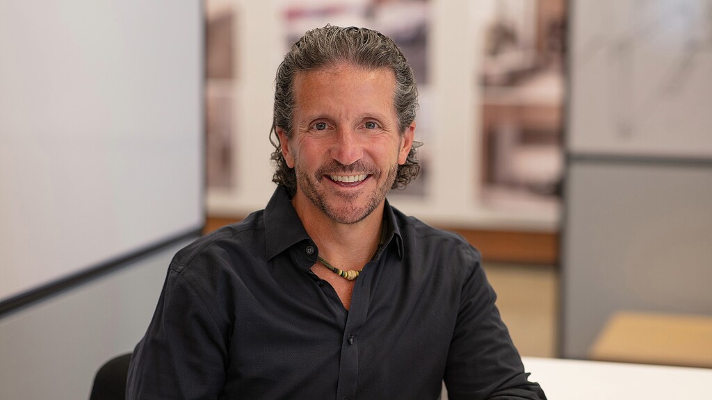 A man smiling for the camera.